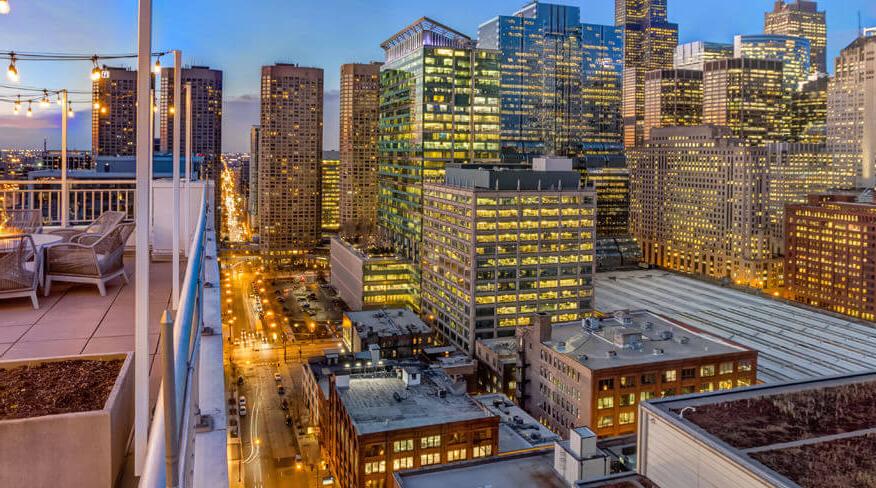 Rooftop view of a modern illuminated city